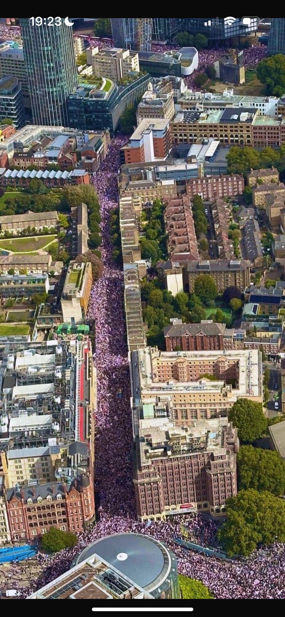 Aerial view showing a densely packed march along a long city block during the 13 September 2025 London protest